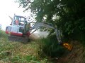 Maaikorven in Almelo aan drukke weg met Takeuchi TB 135 Maaikorven in Almelo aan drukke weg met Takeuchi TB 135