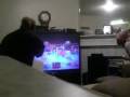 my cousin and i playing wii...looking like fools but having fun nonetheless neither of us know wth we're doing and can you tell that we can't fight in real life? i'm a lover not a fighter