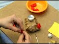 How to Make Decorative Candles : Making Paper Flowers for a Homemade Candle How to Make Decorative Candles : Making Paper Flowers for a Homemade Candle