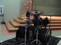 9 year old playing Aerosmith's Dream On on drums