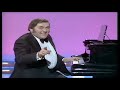 Les Dawson, playing the piano
