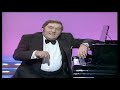 Les Dawson, playing the piano