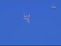 Shuttle Endeavor emits sound of 2 sonic booms