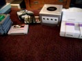 here is what i picked up today. nes system snes system n64 system gamecube system nes games: jackal raid on bungeling bay megaman 2 tmnt monopoly yoshi snes games: super star wars n64 games: zelda ocarina of time paper mario super mario 64 game cube games true crime streets of la metroid prime star fox adventures 4 crap titles game boy advance games: lunar legend super mario advance astro boy omega factor super mario bros 3 super mario world game boy games: pokemon pikachu edition