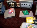 here is what i picked up today. nes system snes system n64 system gamecube system nes games: jackal raid on bungeling bay megaman 2 tmnt monopoly yoshi snes games: super star wars n64 games: zelda ocarina of time paper mario super mario 64 game cube games true crime streets of la metroid prime star fox adventures 4 crap titles game boy advance games: lunar legend super mario advance astro boy omega factor super mario bros 3 super mario world game boy games: pokemon pikachu edition