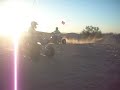 dad jumping small dune