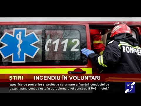 Mașini în flăcări, oameni evacuați