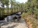 Dead p38 pulled through puddle