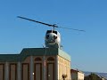 Helicopter loading its belly tanks