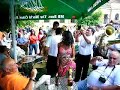 Guca 2007 Brass band playing and gypsy girl dancing Guca 2007 Brass band playing and gypsy girl dancing