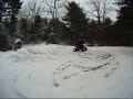 me riding the yfz again in more snow doing more donuts.wmv