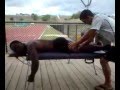 Akwasi Frimpong getting treatment from Tyson Gay's trainer Michael Stroh