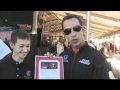 2010-05-22 | Helio Castroneves signs Oprah's No Phone Zone with Zach Veach ~> Helio Castroneves signs Oprah's No Phone Zone ()