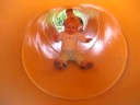 Vivianne going down the tube slide