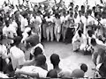 Roda gravada na Praça Sete de Setembro (Belo Horizonte), com os Grupos Capoeira Gerais e Cordão de Ouro Eu Bahia A Senzala. Estavam presentes os Mestres Dunga, Mão Branca, Bocão e outros.Abaixo, informações fornecidas pelo Contramestre Delicado: