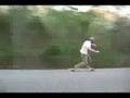 Cyclist tries to pass Dan Dengler on longboard