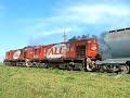 Two Alco-MLWs RSD35 rolling by Two Alco-MLWs RSD35 rolling by