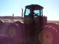 Three JD 830 diesels hooked together plowing