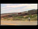 two BNSF stack trains passing by