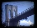 From friends' home movies. We see lower Manhattan by boat including a ferry, a Circle Line boat, South Street Seaport with various ships that were involved with OpSail 76 (could have been before of after), the Ambrose lightship, a crew on the pier, a ferry bedecked with flags, The Floating Hospital, the Brooklyn Bridge, the Wordl Trade Center, some windows on a building that say 