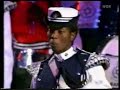 the trinidad and tobago police band 

music: the thunderer by john philip sousa, calypso

military tattoo berlin 2003

part 2:
http://de.youtube.com/watch?v=a54hk2xiu5m