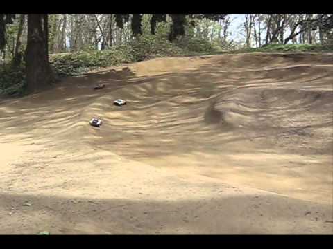 scrt10 - A Lone Ofna Jammin' SCRT 10 holds off a whole pack of Traxxas Slash Fanboys on a cool off road short course track.