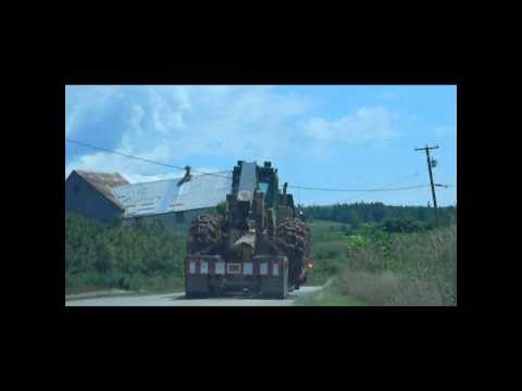 John Deere 648GIII Skidder In Transport