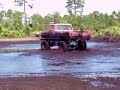 mudding in the red ford after we lifted it.