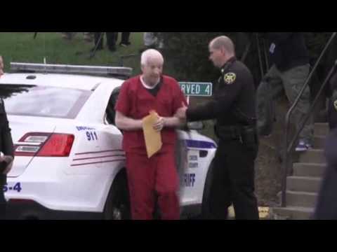 sandusky - Wearing a red prison suit, Jerry Sandusky arrived at a Pennsylvania court on Tuesday to find out how long he will spend behind bars on child molestation char...