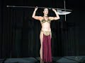 i danced with a vibro axe balanced on my head during my two performances at celebration 4. it was not an easy task, but an impressive one i hope.