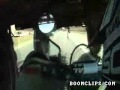 Biker Passes Under Tractor On Highway - biker, crazy, highway, motorcycle, tractor