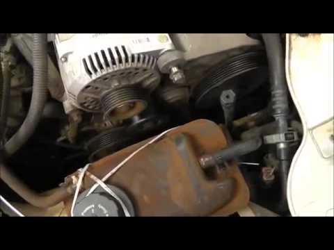 Replacing Head Gaskets  A Ford Taurus 3 0L V6 OHV Engine  With Time Lapse  RWGresearch com clip