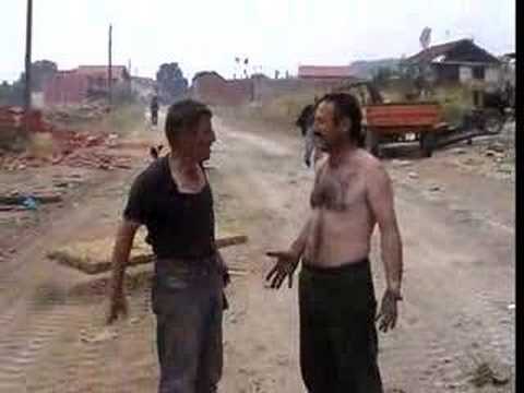 UQK 1999 - Kosovo, early June 1999: hours after Serb forces left the small town of Malisheva, UCK (KLA) fighters and refugees pour into the largely destroyed town.