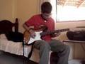 Sidelicia playing guitar