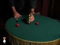 table hopping cups and balls by carl andrews