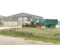 Claas Arion 640 with bailey trailer 2