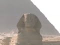 Leading economic expert Jim Rogers traveled to 150 countries over 150000 miles in three years - follow his adventures here on fentonreport. In this video Jim and Paige visit the Pyramids and Sphynx in Giza, Egypt. Copyright Jim Rogers - provided as a special contribution to The Fenton Report. www.fentonreport.com Egypt is a country mainly in North Africa, with the Sinai Peninsula forming a land bridge in Western Asia. Covering an area of about 1010000 square kilometers (390000 sq mi), Egypt borders the Mediterranean Sea to the north, the Gaza Strip and Israel to the northeast, the Red Sea to the east, Sudan to the south and Libya to the west. Egypt is one of the most populous countries in Africa and the Middle East. The great majority of its estimated 82 million live near the banks of the Nile River, in an area of about 40000 square kilometers (15000 sq mi), where the only arable agricultural land is found. The large areas of the Sahara Desert are sparsely inhabited. About half of Egypt's residents live in urban areas, with the majority spread across the densely-populated centres of greater Cairo, Alexandria and other major cities in the Nile Delta. Egypt is famous for its ancient civilization and some of the world's most famous monuments, including the Giza pyramid complex and its Great Sphinx. The southern city of Luxor contains numerous ancient artifacts, such as the Karnak Temple and the Valley of the Kings. Egypt is widely regarded as an important political and <b>...</b>