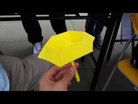 how to fold an umbrella properly
