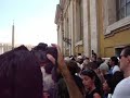 An dude talking from a window