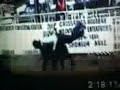 horses dragging cowboys.