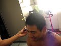alex gets his hair cut