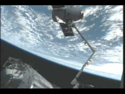 the station - The Expedition 31 crew used the Canadarm2 robotic arm to demate the SpaceX Dragon cargo vehicle from the Earth-facing port of the station's Harmony node at 4...
