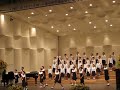 Korean school children singing 