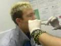 mini getting his tongue pierced