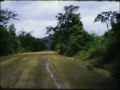 Silent film shot on Super 8mm. Road trip in 1975 from Monrovia to Bomi Hills in a Ford Cortina - thanks to the endless patience and good humour of my driver, James Akoi (his country name was Waywoh). Bomi Hills is in the west of Liberia, and was the location of iron ore mining. A couple of brief scenes in the second half of the film provide a tiny glimpse of the deforestation and pollution caused by large scale mining and the uncontrolled disposal of tailings.