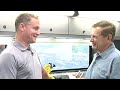 rob burbick of nike golf talks about tiger's clubs in the nike tour van at the byron nelson championship with russ ryden of devoted golfer.tv.