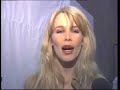 this is a promo produced by kane farabaugh in the command information department of afkn in seoul, south korea in 1997 (yongsan army garrison).  part of a series of spots that served as promos for the military broadcasting network.  it features claudia schiffer giving wink, and army seargeant rob couture dancing crazy!