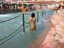 bathing in ganga - a bath in the holy ganga in haridwar, at hari-ki-pauri.