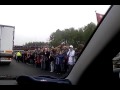 Supporters FC Twente langs snelweg A1 ter hoogte van Holten