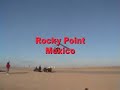 john takes a flight over the sandy beach at rocky point mexico. pilot is alfredo, flying a 55hp cosmos brand ultra light trike.